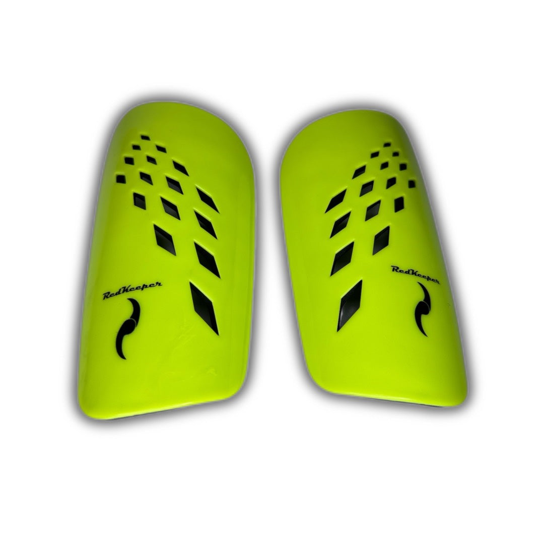 Canilleras de futbol amarillo fluor