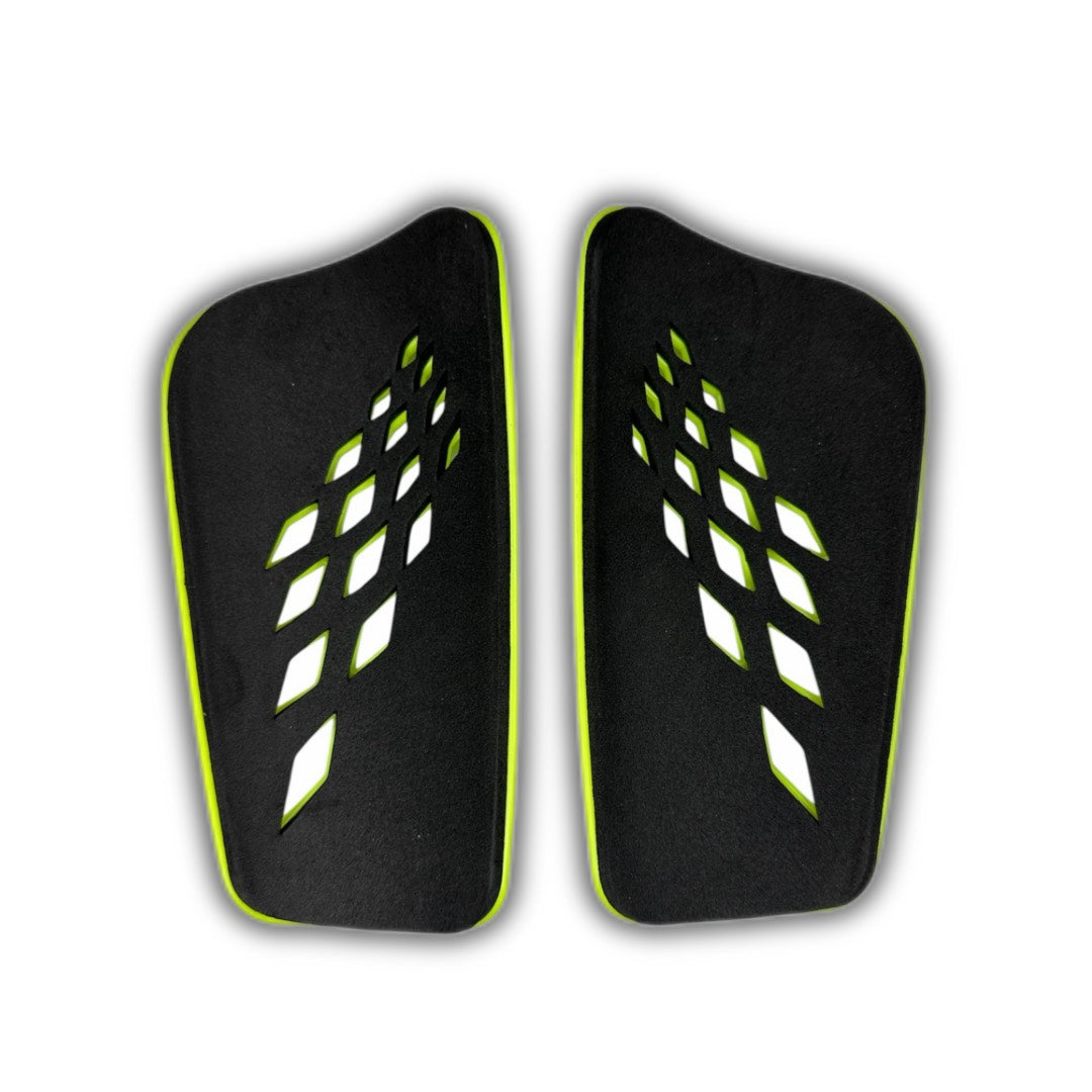 Canilleras de futbol amarillo fluor